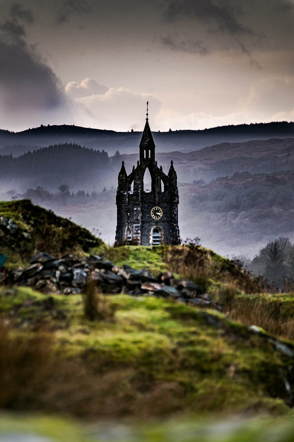 black and white castle on green grass field