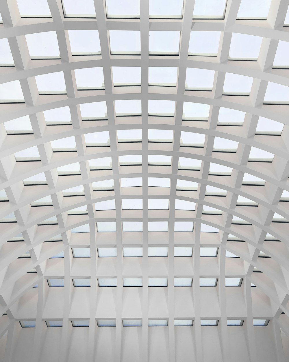 white metal frame ceiling during daytime