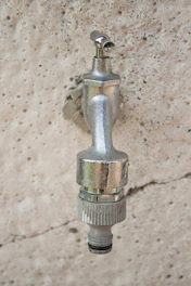 A shiny internal fire tap installed neatly on a wall.