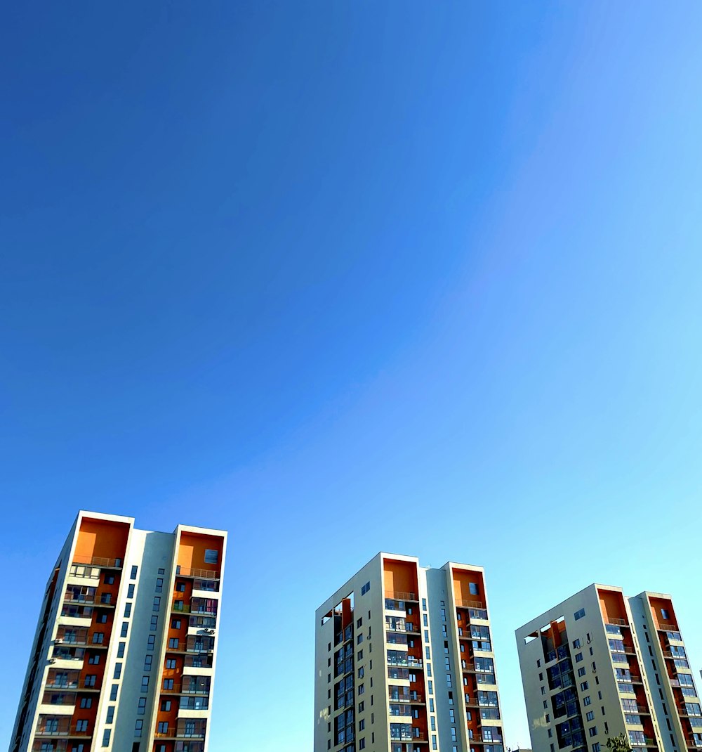 white and green concrete building under blue sky during daytime