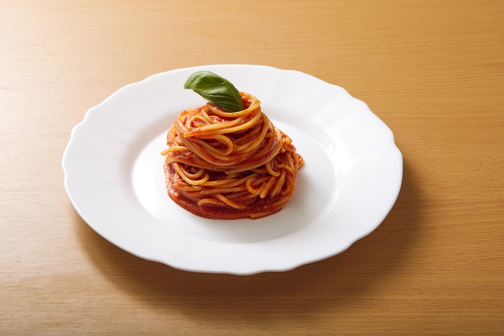 spaghetti on white ceramic plate