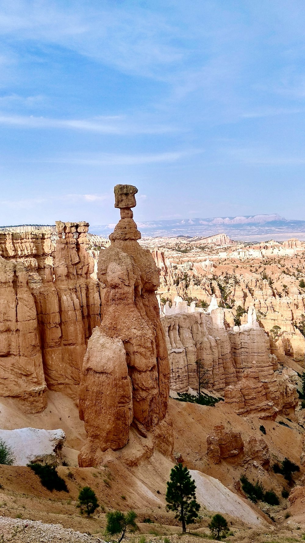 brown rock formation under blue sky during daytime