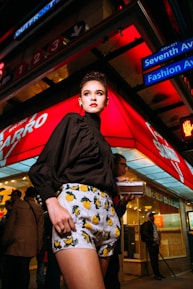 A vibrant street scene with a model wearing Papilora’s latest urban outfit.