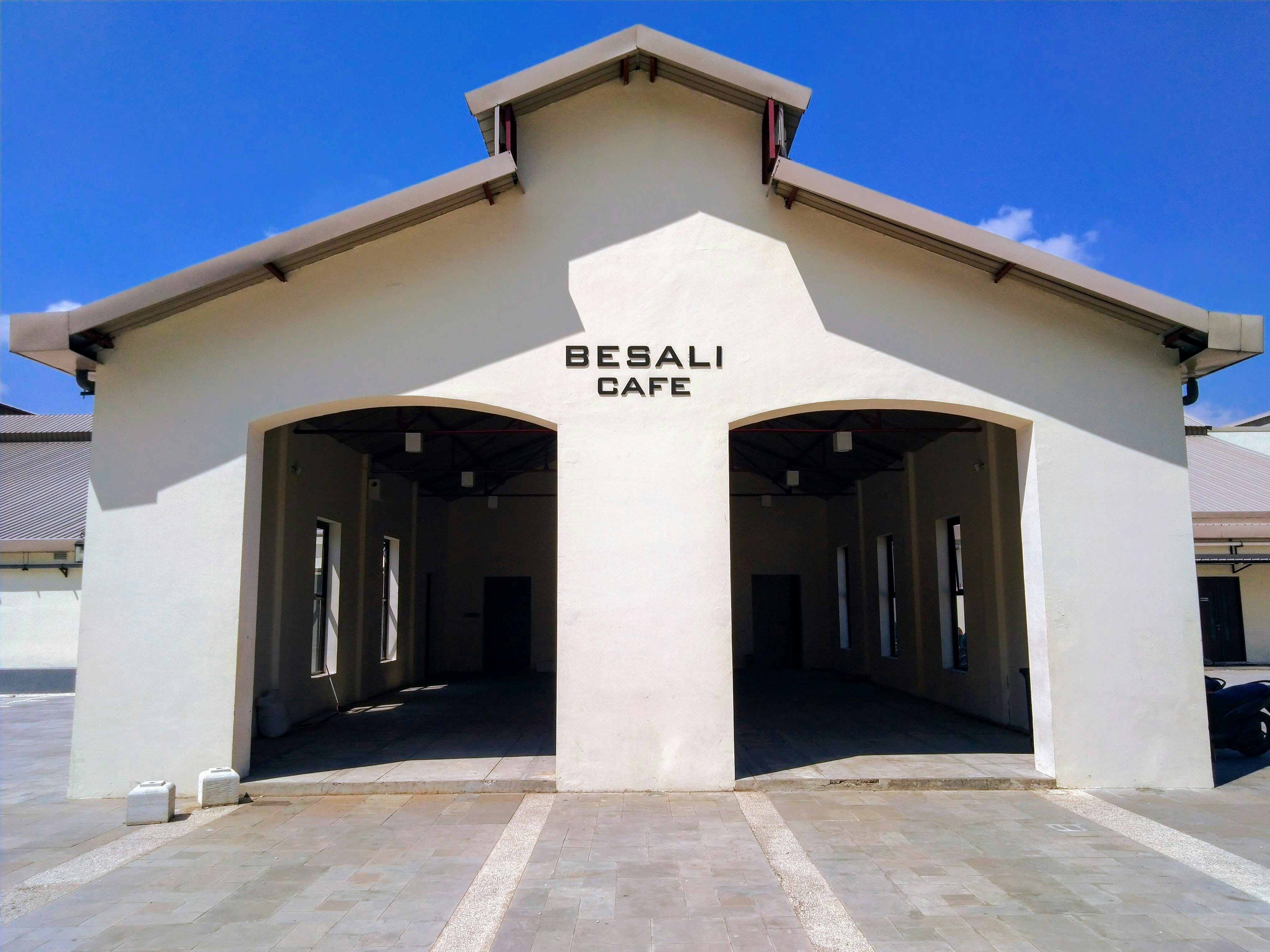 white concrete building under blue sky during daytime