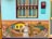 A vibrant mural depicts a baker dressed in a traditional outfit, pulling bread from a rustic oven. The background features colorful houses and a scenic landscape with mountains and a body of water. Lush tropical plants and flowers are illustrated in the foreground. The mural is part of a building's exterior wall, with a window and utility box above.