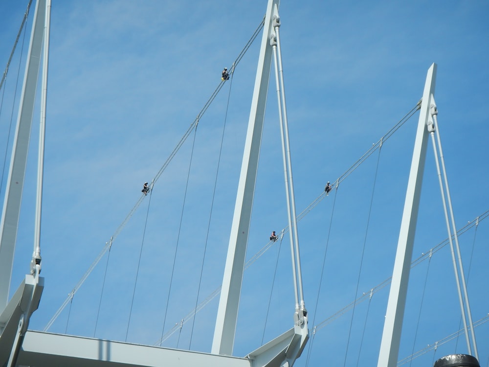 white metal bridge under blue sky during daytime