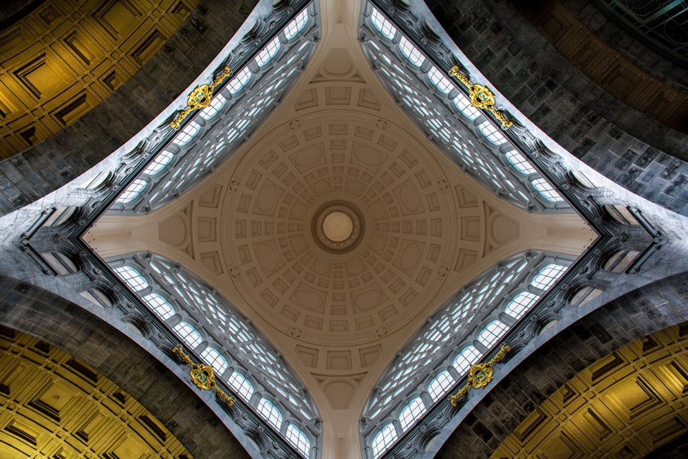 white and brown ceiling with glass windows