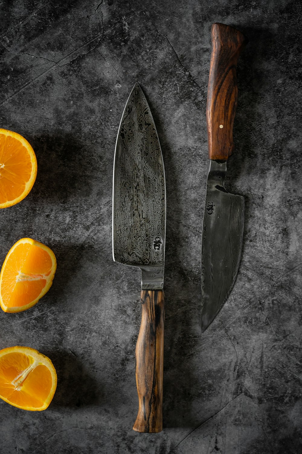 sliced lemon beside brown handled knife
