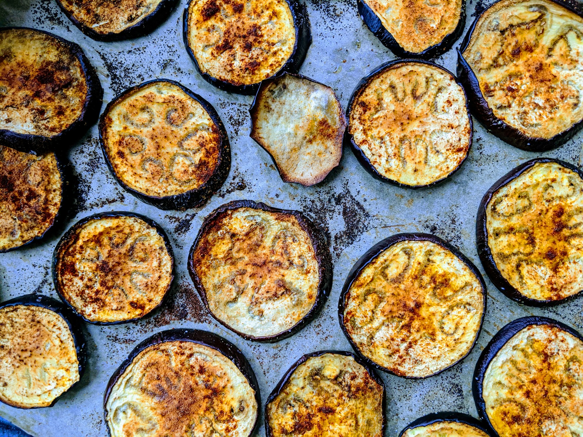 Aubergine slices are a great low carb pasta alternative for lasagna by Lucian Alexe for Unsplash.