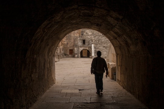man in black jacket standing on brown brick hallway in Sarıabalı Turkey