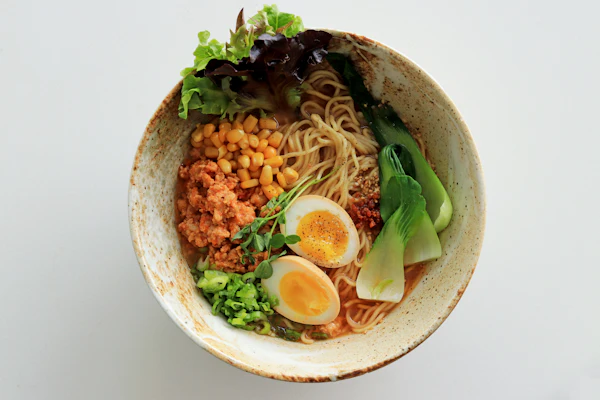 12hr tonkotsu, runny ajitama, scallion confetti. Slurp loud.