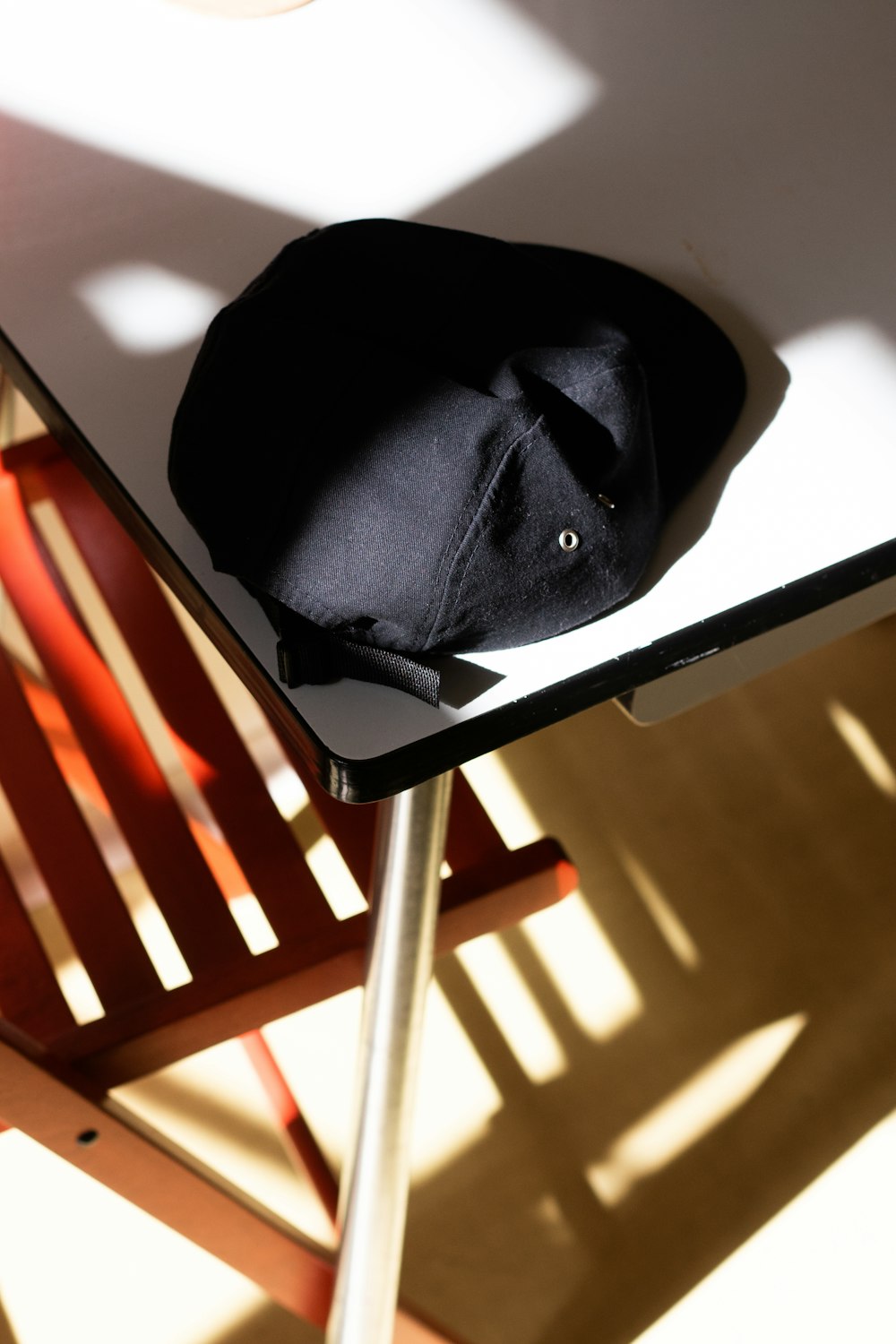 black textile on brown wooden chair