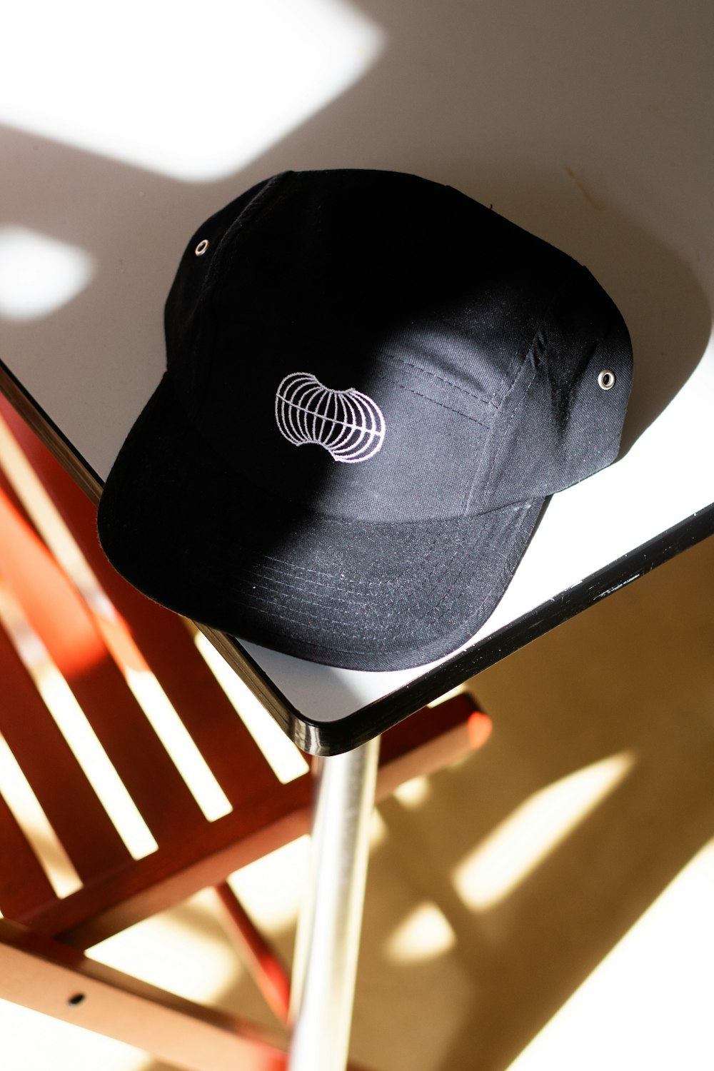 black and white fitted cap