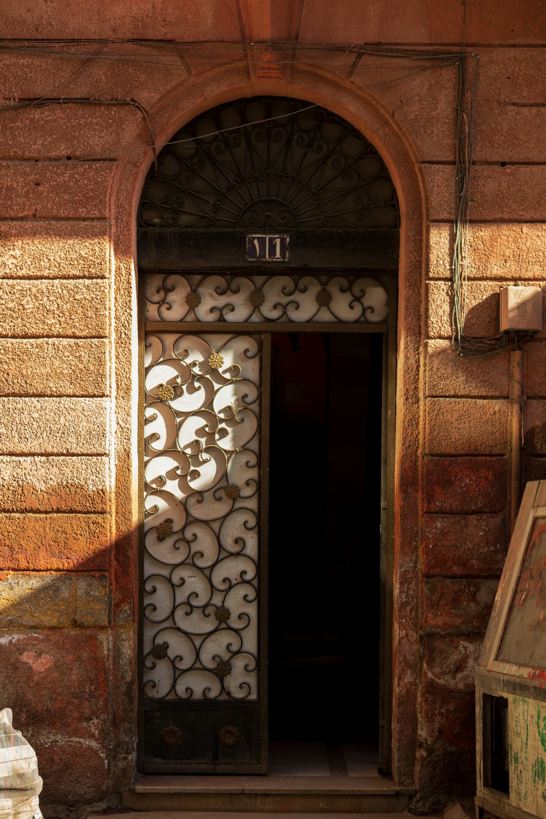 brown wooden door with white steel door