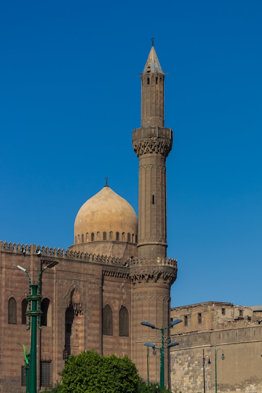 brown concrete dome building under blue sky during daytime in Al-Nasser Mohammed Ibn Kalawoun Egypt