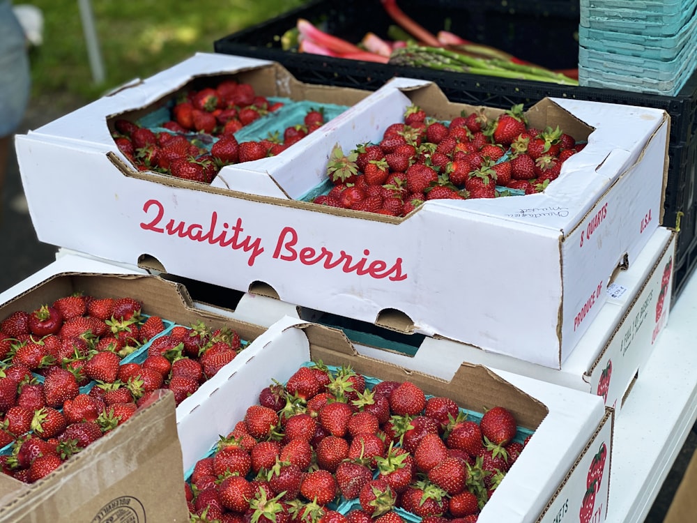 strawberries in white cardboard box