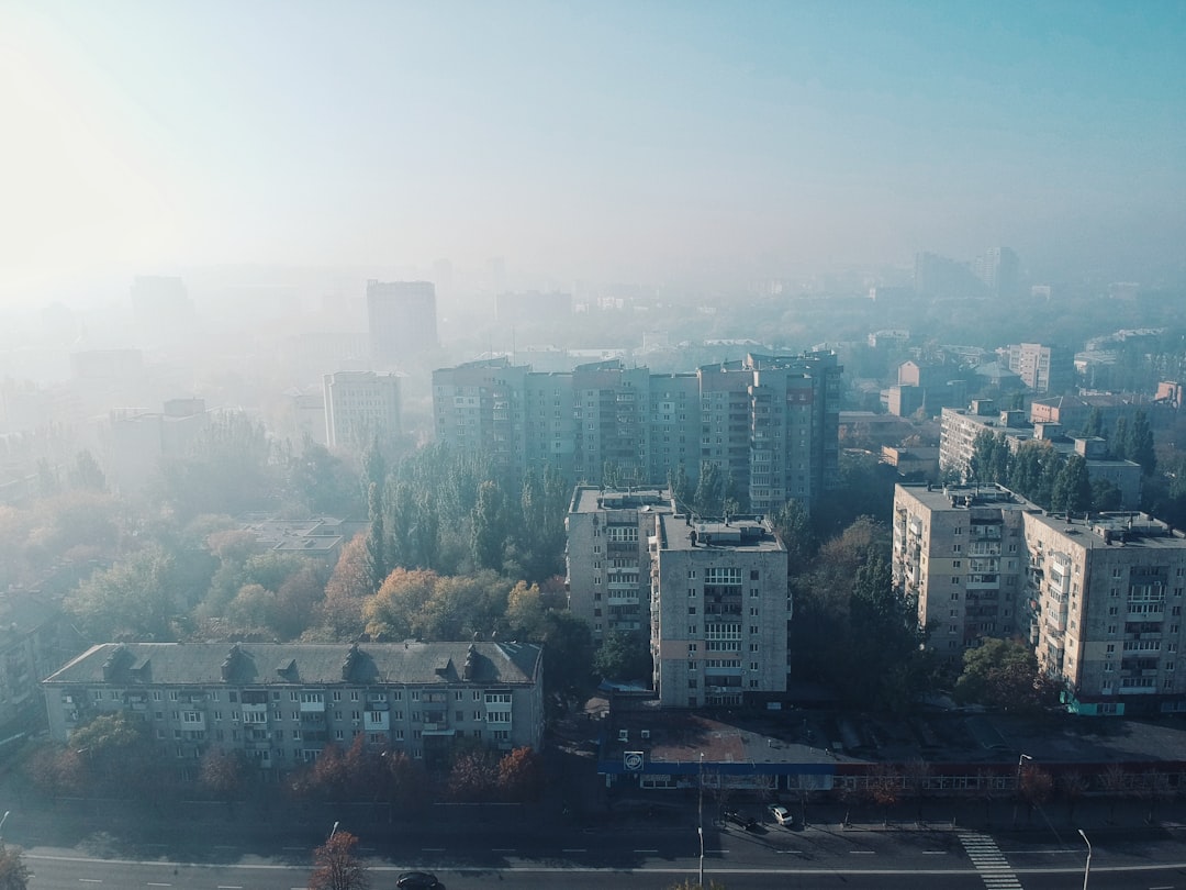 city skyline under white sky during daytime