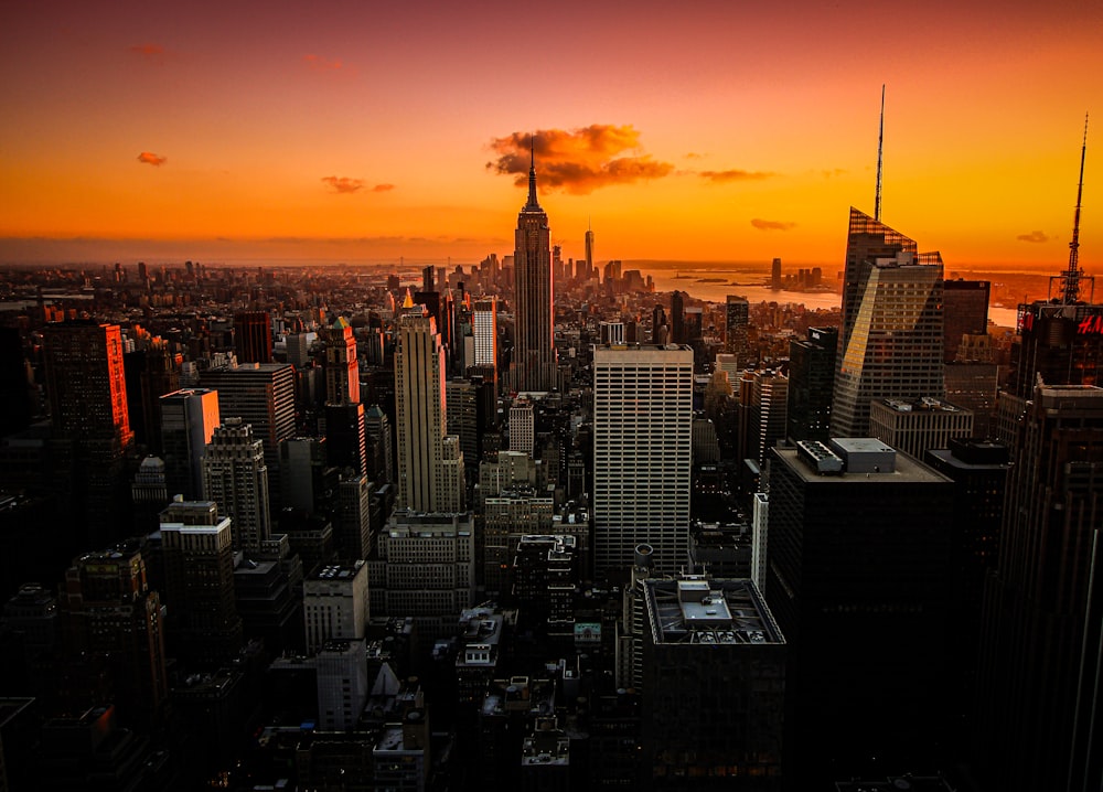 high rise buildings during sunset