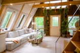 white sofa set near window