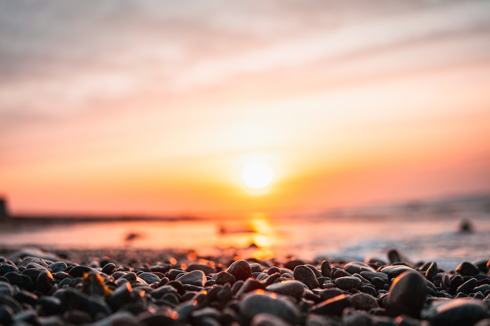 black and white stones during sunset