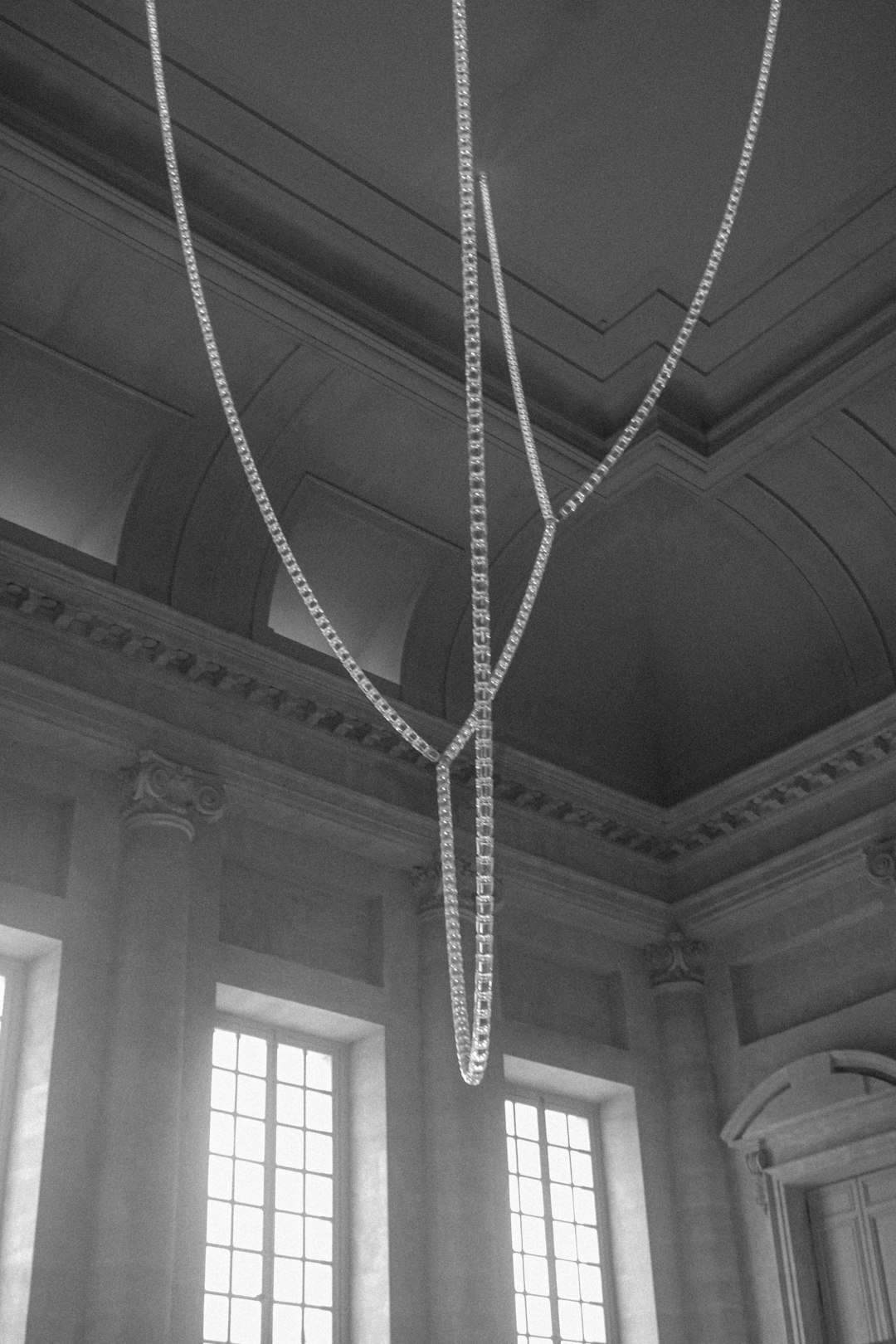 grayscale photo of string lights
