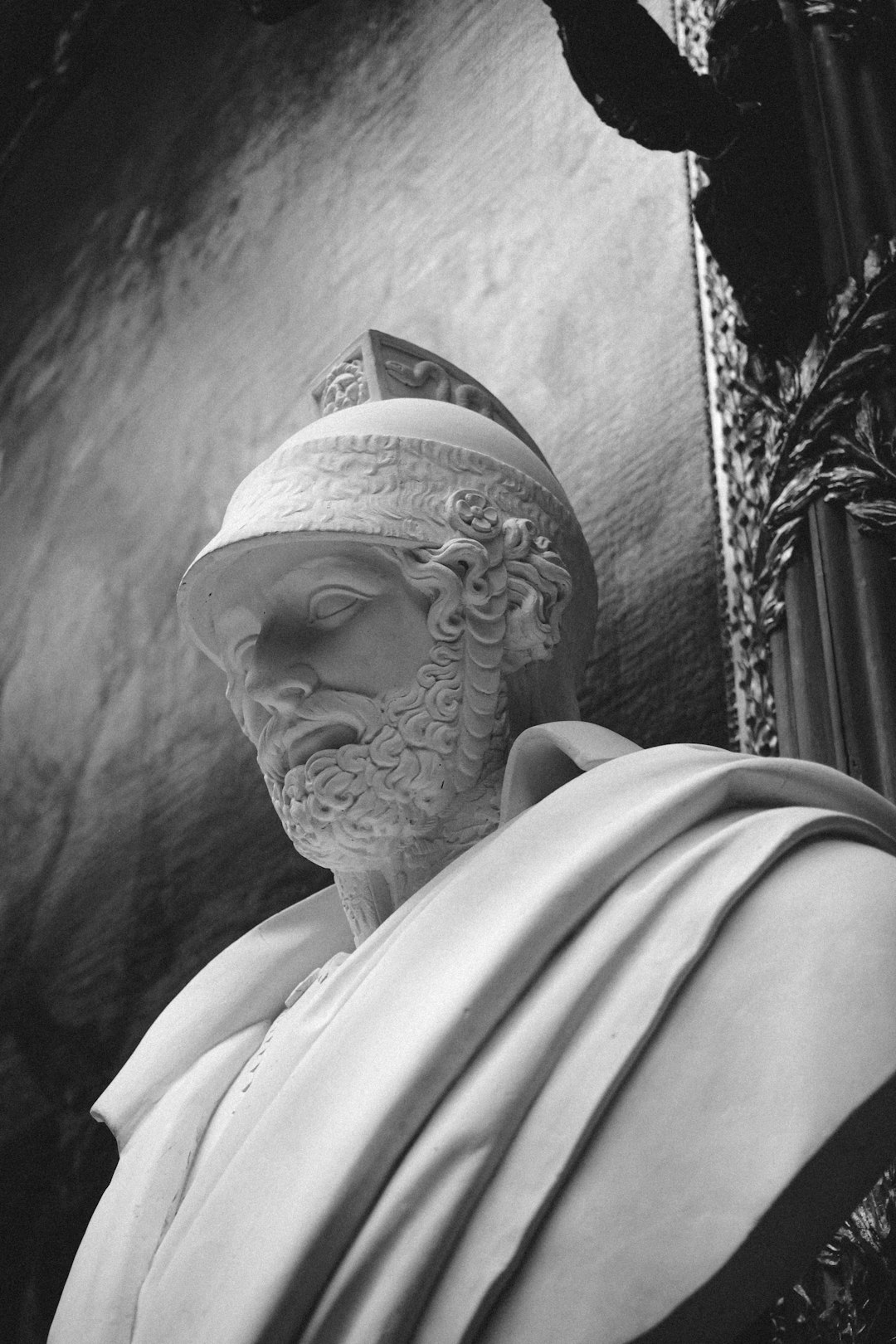 grayscale photo of man wearing white turban