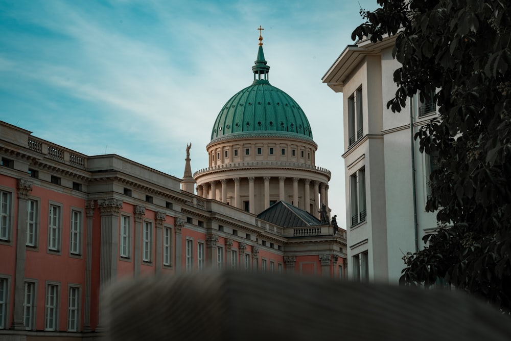 white and green dome building