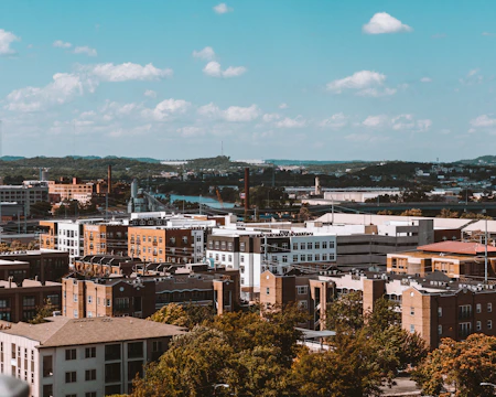 brown and white concrete buildings under blue sky during daytime