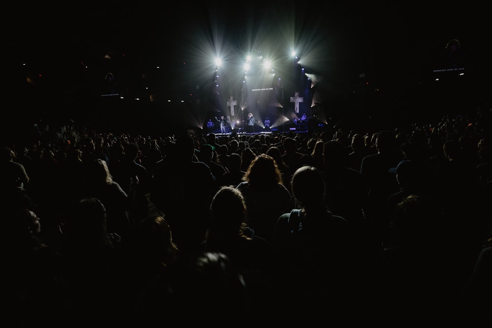 people watching concert during night time