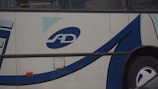 Close-up of the Budduh Slim Transports logo on the side of a polished transport vehicle.