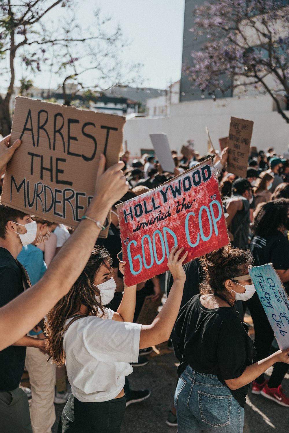 people holding happy birthday signage during daytime