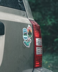 red car with white and blue sticker
