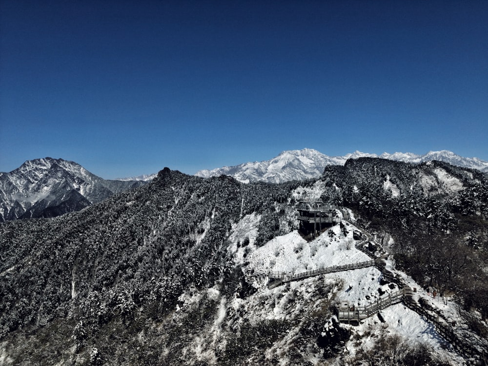 snow covered mountain under blue sky during daytime