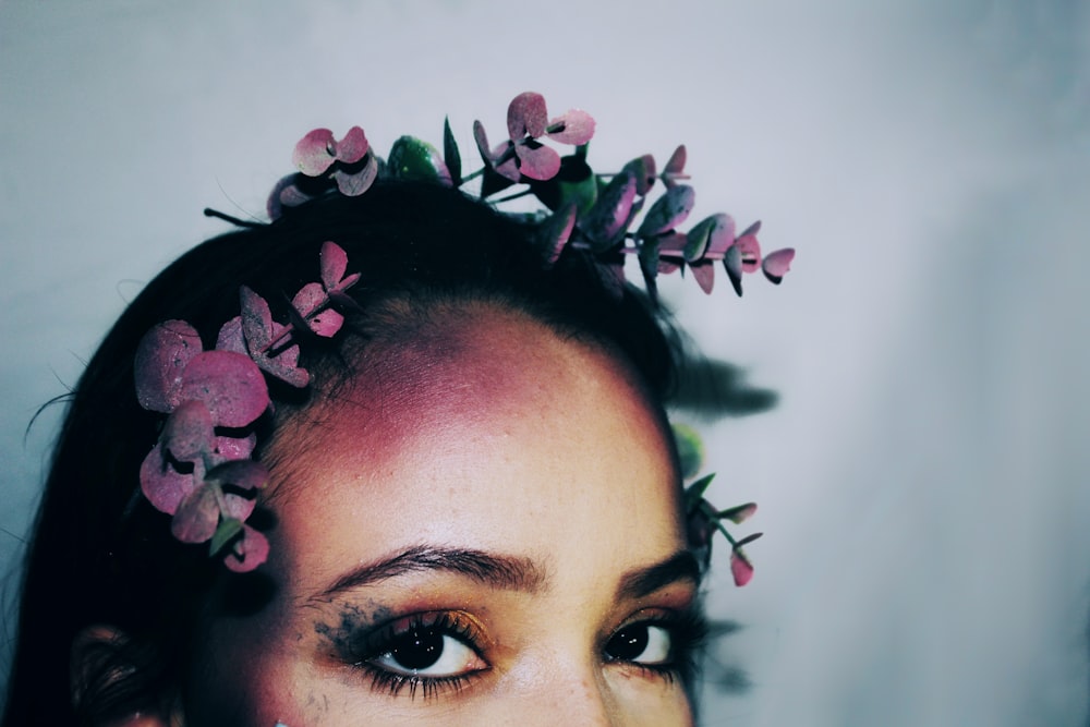 woman with white and purple flower headband