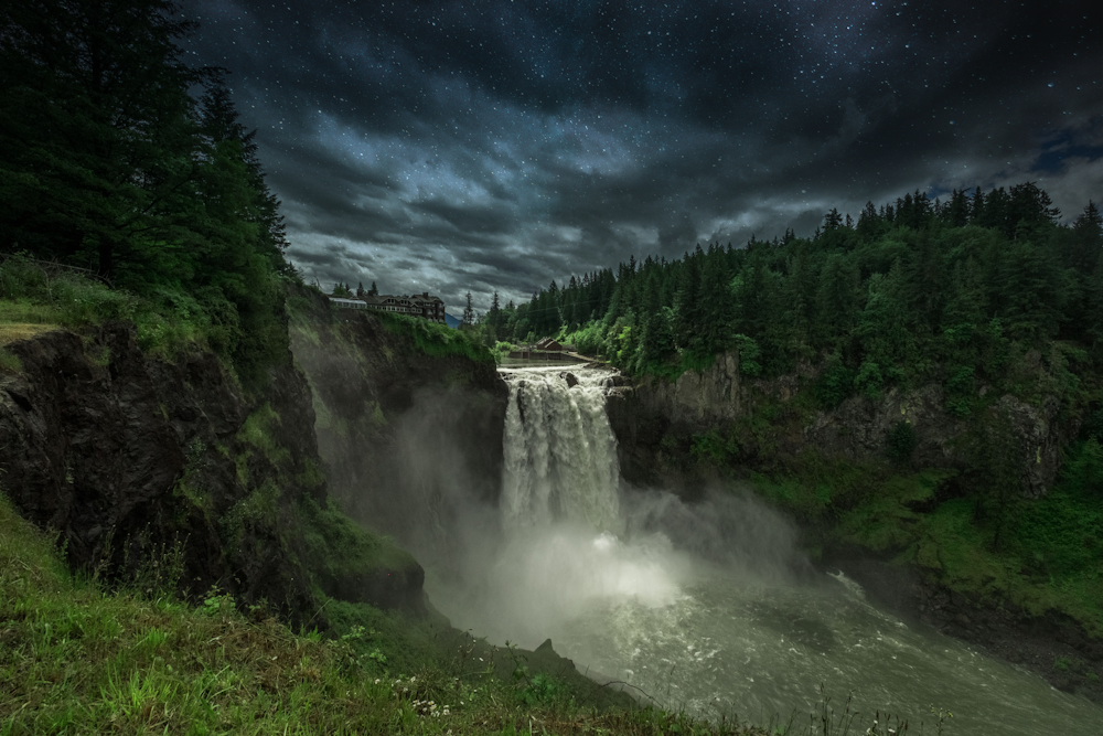 waterfalls under blue sky and white clouds during daytime