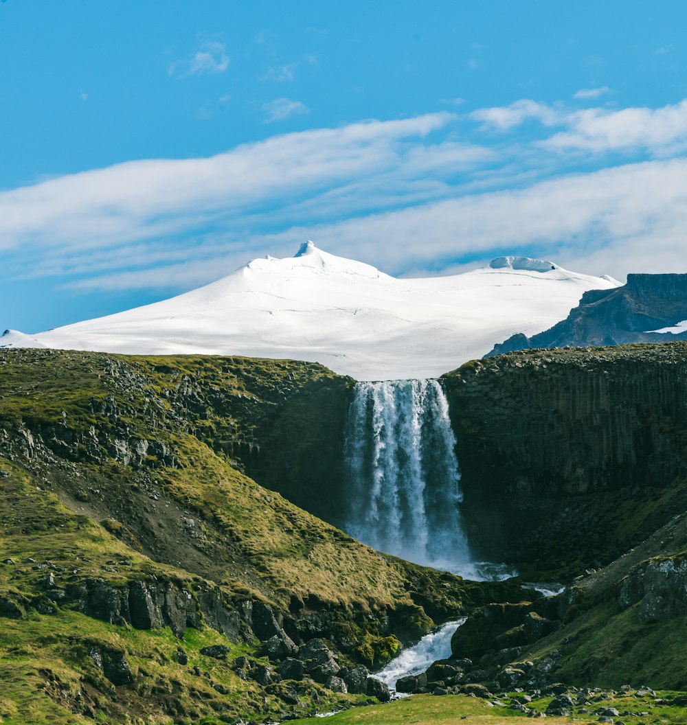 green and white mountain under blue sky during daytime