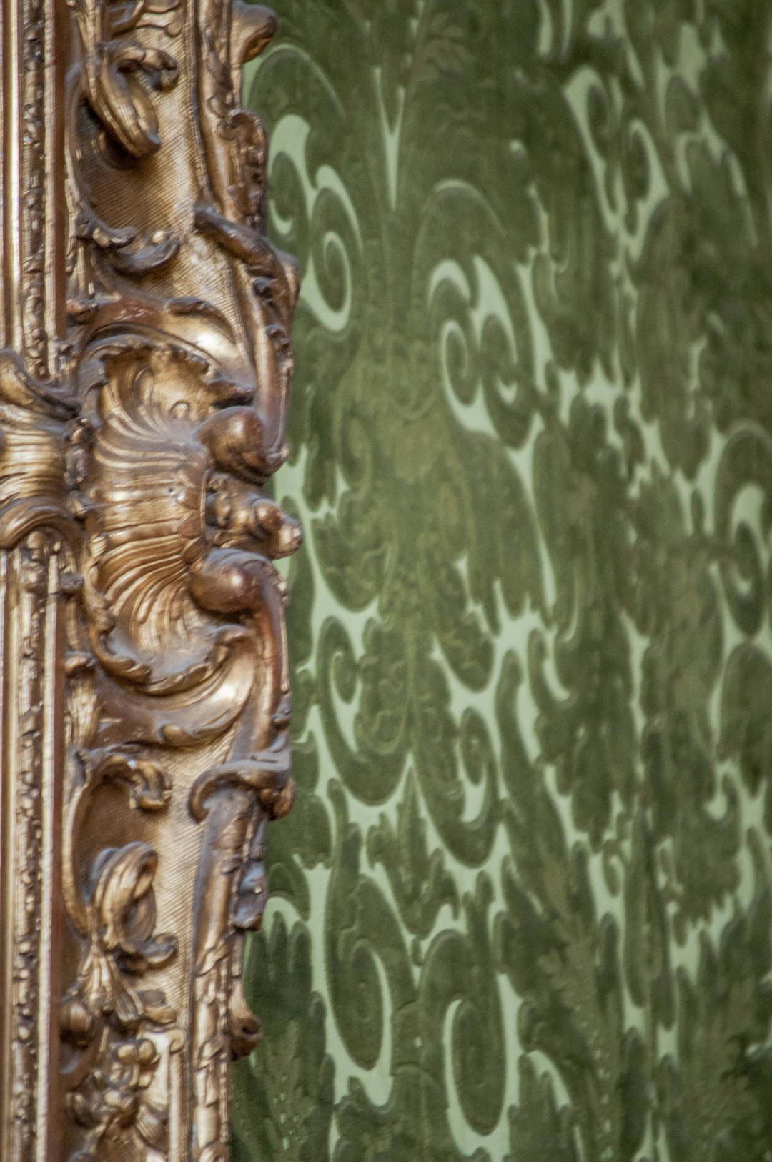 brown wooden door with brass door lever