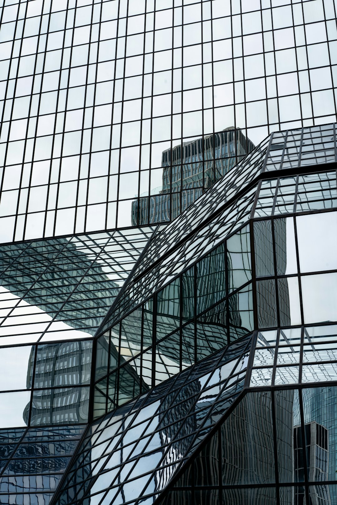 black glass walled high rise building