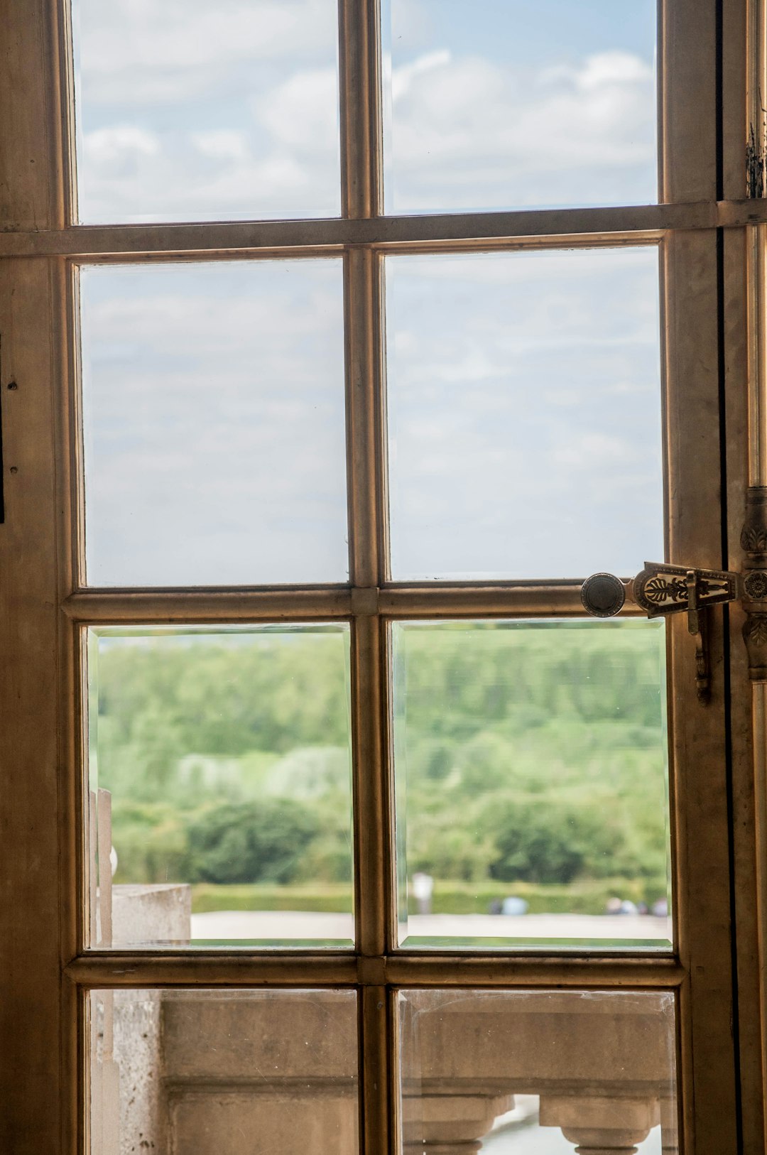 brown wooden framed glass window