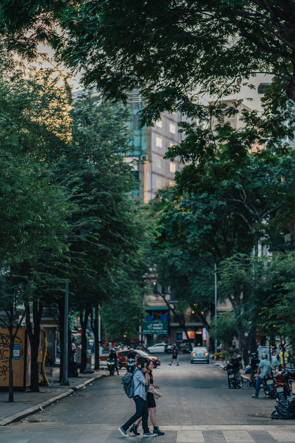 green trees near white concrete building during daytime