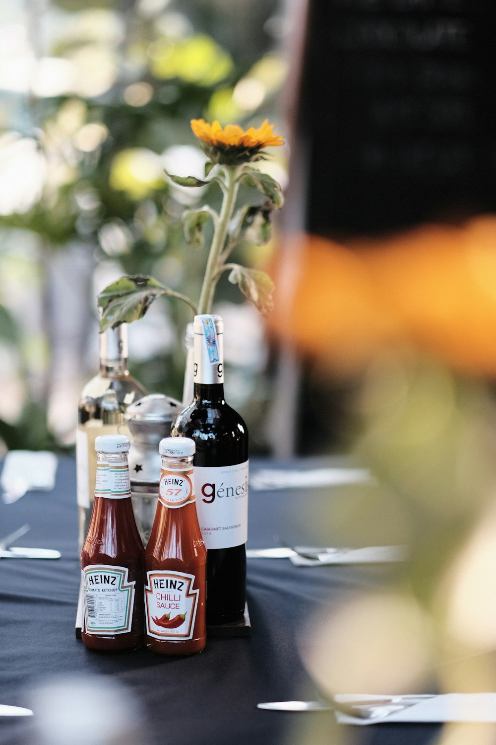 selective focus photography of wine bottles on table