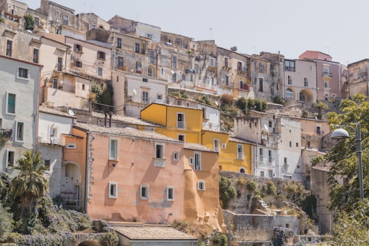 brown and white concrete buildings during daytime in Ragusa Italy