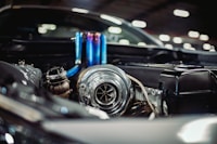Routed charge piping inside engine bay