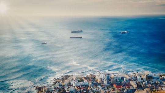 aerial view of city buildings near body of water during daytime in Sea Point South Africa