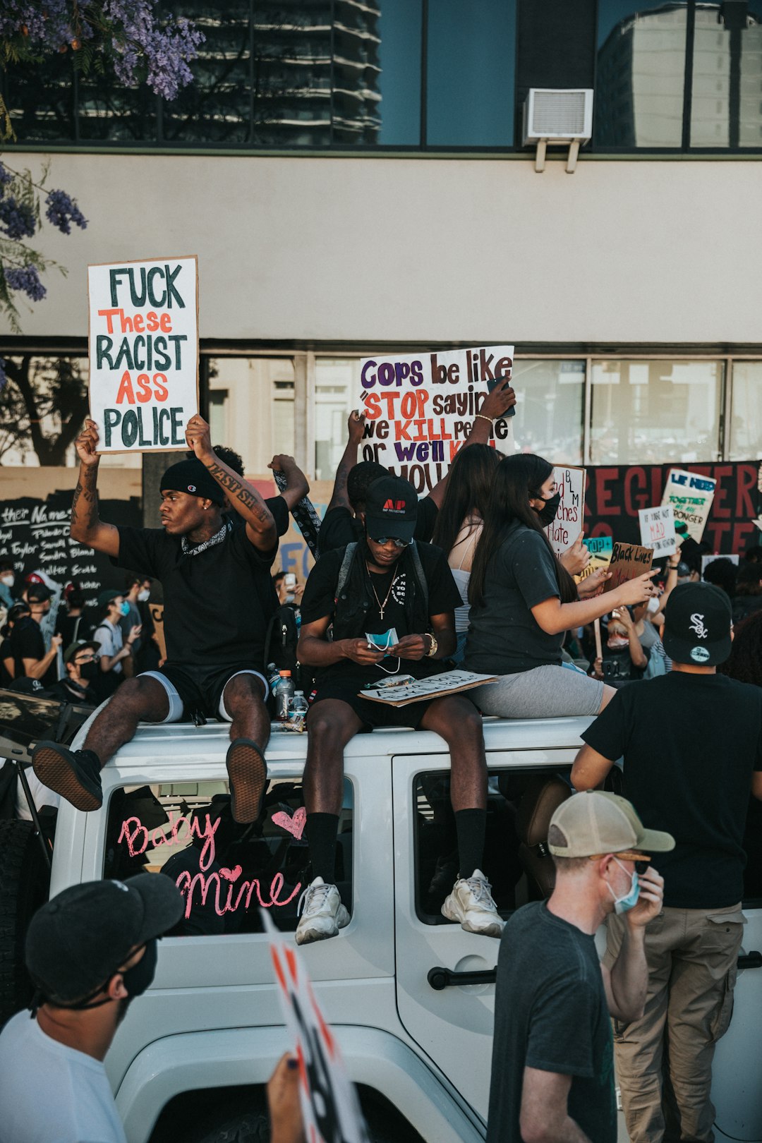 people sitting on chair in front of table