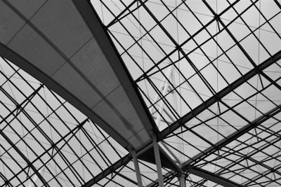 white metal frame in grayscale photography
