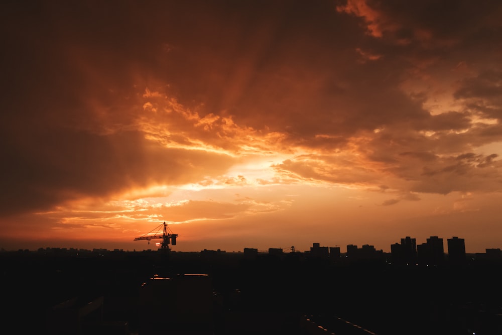 silhouette of buildings during sunset