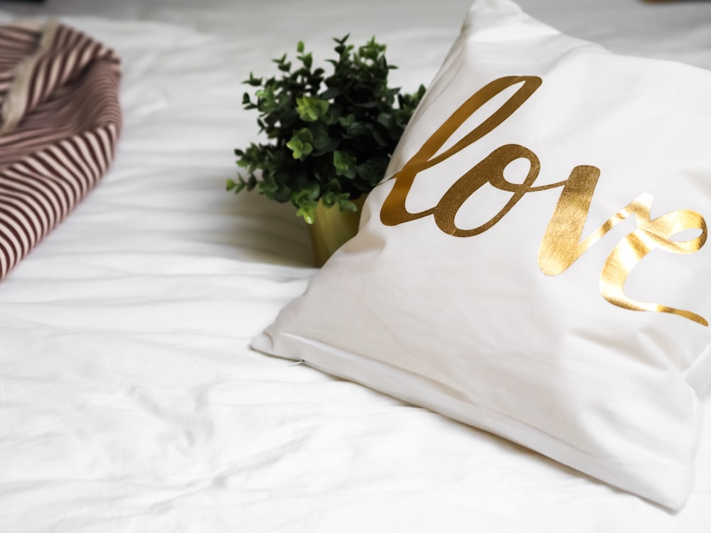 white and brown love throw pillow
