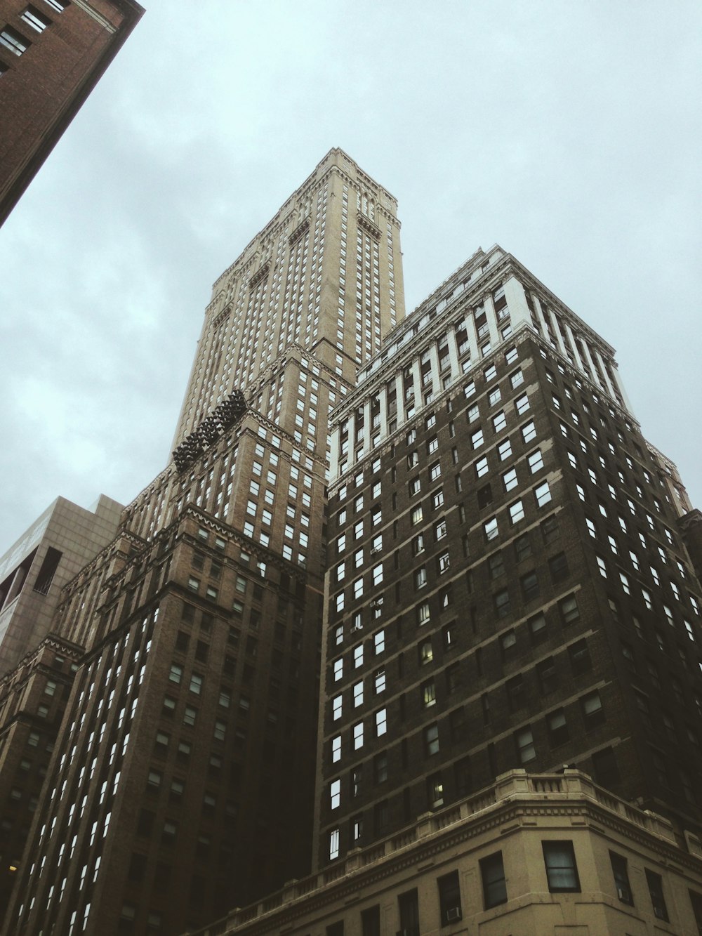 low angle photography of high rise building