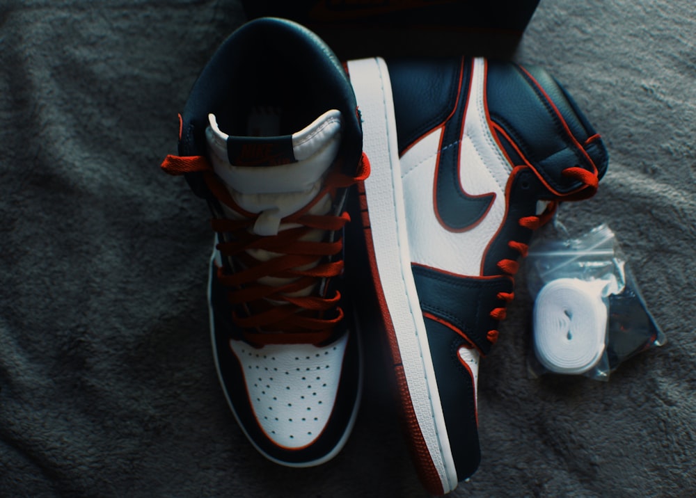 pair of triple black Nike Air Huarache sneakers photo – Free Apparel Image  on Unsplash